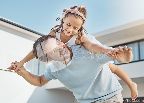 Image of Father playing, piggyback or child in new home as a happy family on real estate with love, smile or care. Airplane, flying or fun kid with proud dad on property in relocation together in dream house