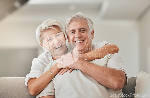 Image of Happy senior couple, portrait and hug on living room sofa for embrace, relationship or love at home. Mature woman hugging man with smile in happiness for care, support or trust together in house