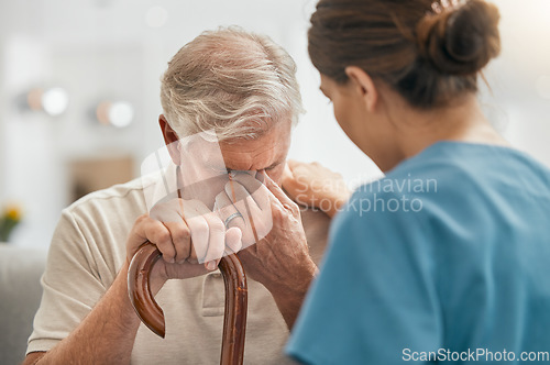 Image of Nurse, support and sad senior man with cane, depression and anxiety in home. Caregiver, comfort and help elderly person with a disability, walking stick and empathy for stress, retirement and pain