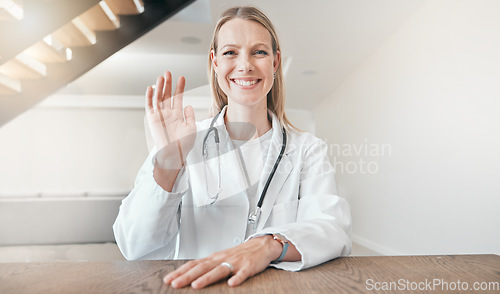 Image of Doctor, portrait or wave on video call with smile at desk for a telehealth service or hello for kindness. Face, sign language or happy woman in webinar teaching healthcare, help or advice online