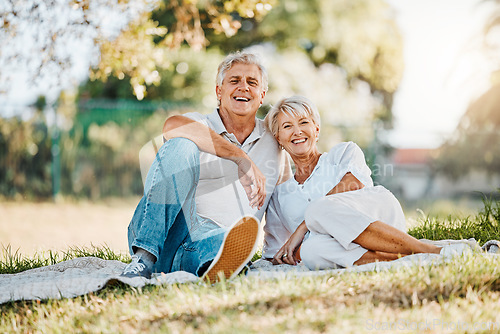 Image of Senior couple, portrait or picnic in park for love, support or bonding retirement in Australia nature garden. Smile, relax and elderly man and happy woman on blanket in backyard grass field for break