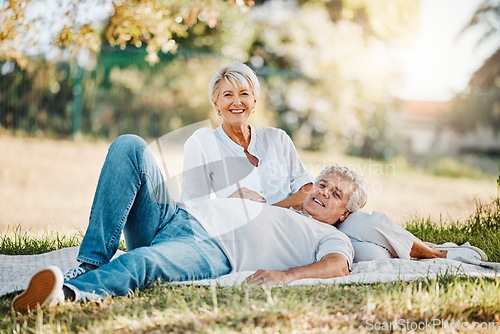 Image of Senior happy couple, portrait or picnic in park for love, support or bonding retirement in Australia nature garden. Smile, relax and elderly man and woman on blanket in backyard grass field for break