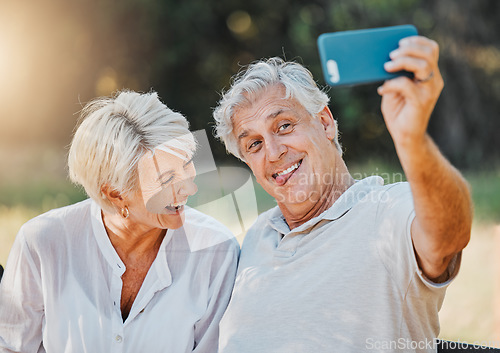 Image of Senior couple, tongue and selfie in outdoor nature garden for love memory, connection and retirement emoji. Elderly man, funny face and laughing woman for social media photography and profile picture