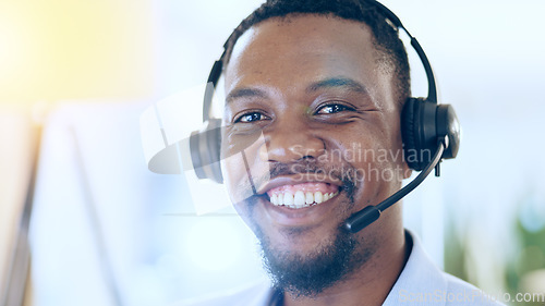 Image of Portrait, call center and smile of black man in telemarketing, support and help desk in office in Nigeria. Customer service, sales agent and happy face of African business professional in headphones