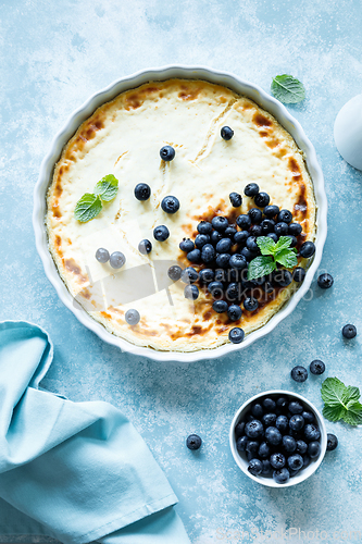 Image of Cottage cheese cheesecake with fresh blueberry, top down view