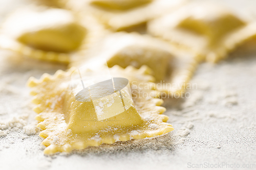 Image of Cooking ravioli on a floured kitchen table