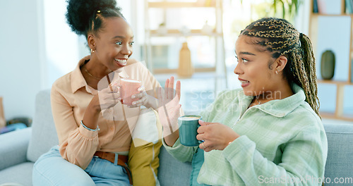 Image of Woman, best friends and talk with coffee in living room with smile, happiness or excitement. African, people and bonding with gossip, conversation or discussion for advice on sofa, joke or tea in cup