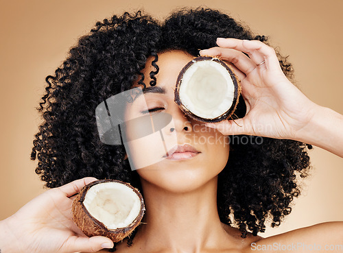 Image of Relax woman, beauty face or coconut skincare treatment, vegan nutritionist or organic cosmetics, natural antioxidants or self care. Eyes closed, fruit oil benefits or product girl on brown background