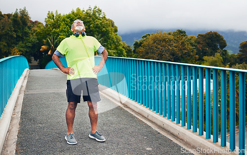 Image of Fitness, tired or senior man on bridge for walking or trekking journey or adventure for freedom on break. Hiking, relax or exhausted mature hiker with fatigue in exercise, fitness or workout in Peru