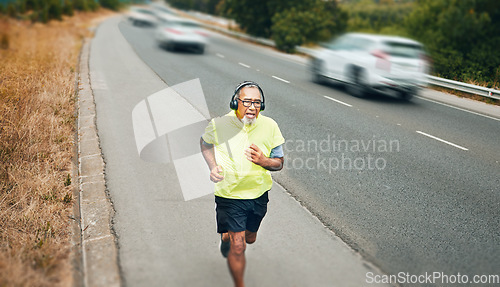 Image of City, running and senior man with fitness, training and workout with wellness, health and headphones. Old person, athlete and runner with headset, outdoor and marathon with exercise and challenge