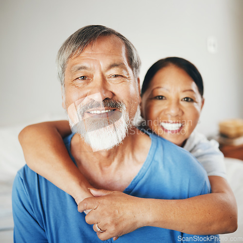 Image of Senior, hug and couple with smile in portrait for happiness, excited or relaxed in bedroom. Asian man and woman for elderly and married with enjoyment in retirement by together, care or bond for love