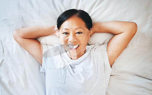 Image of Bed, portrait and happy mature woman sleeping, tired or nap for stress relief, morning wellness or retirement rest. Top view, happiness or relax Asian person cozy, dream or exhausted in home bedroom