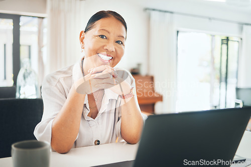 Image of Mature woman, portrait and happy on laptop for home investment, asset management or pension research. Face of Asian person on computer in kitchen for morning email, registration or financial planning