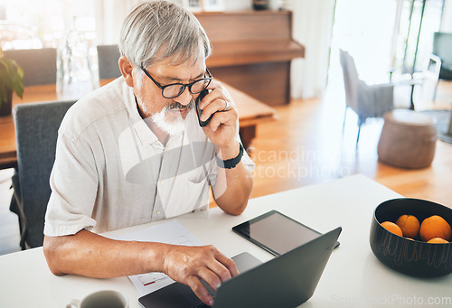 Image of Business man, home phone call and laptop for planning, online investment and communication on technology. Senior person, CEO or entrepreneur typing on computer, talking on mobile or remote networking