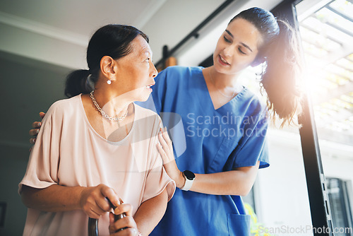 Image of Walking stick, senior woman and doctor for home support, helping and kindness with retirement or nursing service. Medical student, nurse or caregiver and elderly patient with disability in healthcare