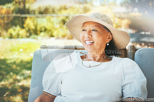 Image of Senior woman, outdoor and alone to relax, leisure and patio to enjoy retirement, morning sunrise or fresh air. Happiness, elderly and retired with smile, face and freedom for free time, calm or joy