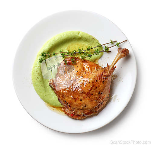 Image of plate of duck leg confit