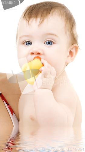 Image of baby with duck