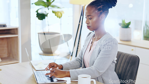 Image of Business, laptop and black woman in office typing, planning or reading project proposal, report or feedback. Planning, research and African female manager online for schedule management or analysis