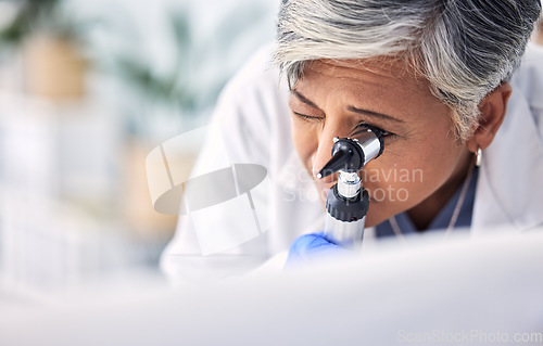 Image of Mature woman, doctor and otoscope, hearing test and exam for audiology check, consultation and healthcare. Ent tools, otolaryngology and medical professional with equipment for wellness in hospital