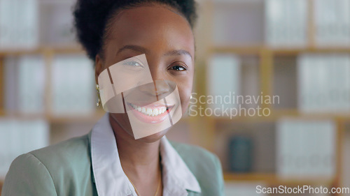 Image of Portrait, leadership and business black woman manager in an office at night for corporate or professional work. Face, management and smile with a happy young CEO or boss in a suit at the workplace