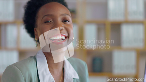 Image of Portrait, laughing and business black woman manager in an office at night for corporate or professional work. Face, management and funny with a happy young CEO or boss in a suit at the workplace