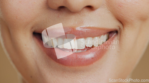 Image of Woman, smile and closeup in studio for dental wellness, beauty and change with cosmetics by background. Girl, teeth whitening and happy for clean mouth, health and zoom for oral care with hygiene