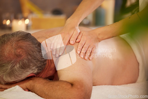 Image of Senior man, hands of masseuse and back massage with physical therapy at spa, healing and wellness for stress relief. Self care, treatment and skin with shine, bodycare and relax at resort with calm