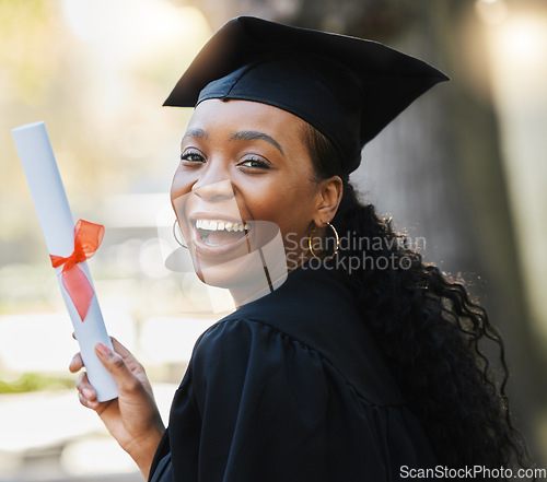 Image of Graduation, diploma and portrait of happy black woman celebrate success, education and college scholarship outdoor. University graduate smile with certificate, award and certified student achievement
