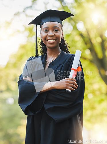 Image of Graduate, diploma and portrait of black woman outdoor with arms crossed to celebrate success, education and college scholarship. Happy student, university graduation or achievement of certified award