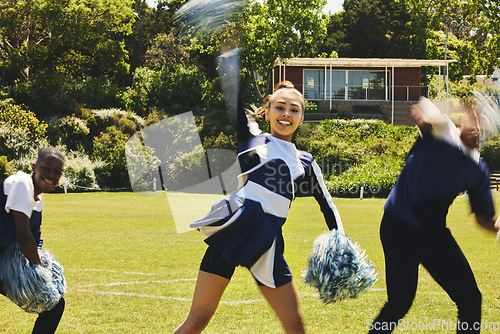 Image of Cheerleader, people and teamwork with hand up in routine at university stadium, sport and uniform for game. Asian teen, diversity and team in collaboration with pom poms and fitness for competition