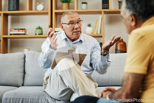 Image of Senior man speaking to a psychologist at mental health, psychology and therapy clinic for session. Psychological therapist with clipboard for counseling checklist with elderly male patient in office.