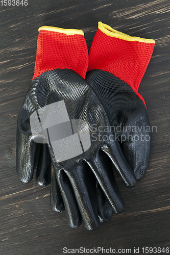 Image of black rubberized gloves