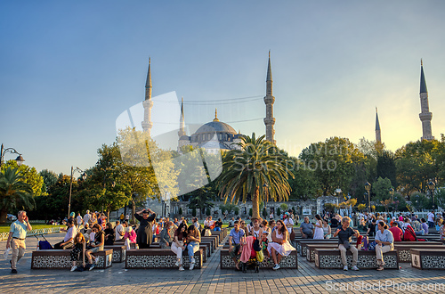 Image of people resting in Sultan Ahmed park Istanbul, Turkey