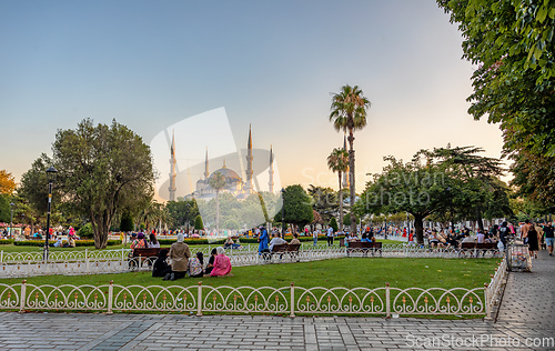 Image of people resting in Sultan Ahmed park Istanbul, Turkey