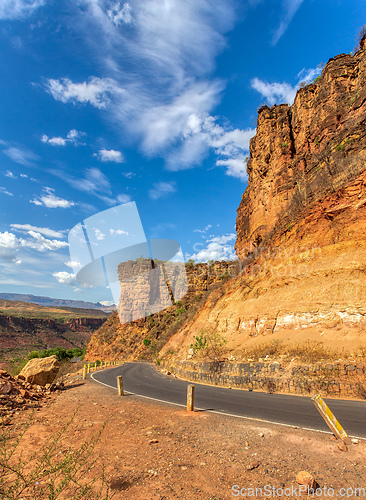 Image of Asphalt road descending to the bridge over the blue nile,. Ethiopia, Africa