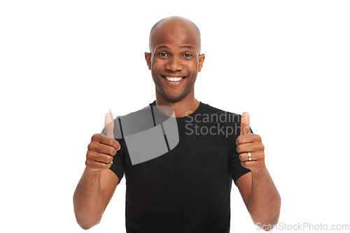 Image of Studio portrait, man and thumbs up with smile for vote emoji, feedback and review on white background. Black model, face and hand gesture for yes with positive, agreement and winner with approval