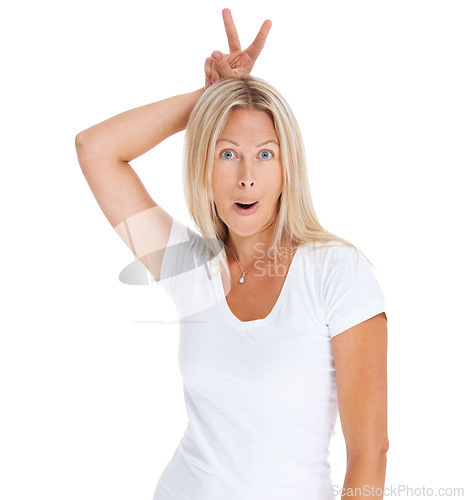 Image of Woman, bunny ears and finger portrait in studio fun surprise, happy or natural face. Female model person, t-shirt and rabbit hand white background for excited, personality emoji or crazy wow comedy