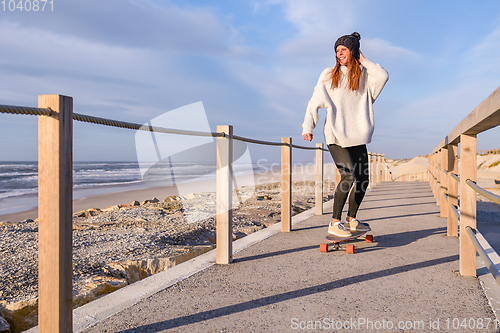 Image of Girl riding a skateboard 