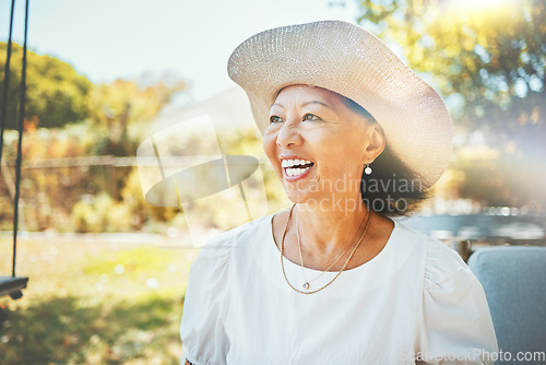 Image of Thinking, outdoor and senior woman with a smile, memory and nature with sunshine, cheerful and peace. Pensioner, elderly person and old lady with happiness, remember and nostalgia with retirement