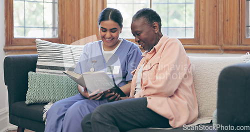 Image of Senior, woman or nurse with book for reading, relax or retirement on sofa in living room of nursing home. Elderly, professional or caregiver with novel, communication or discussion on couch in lounge