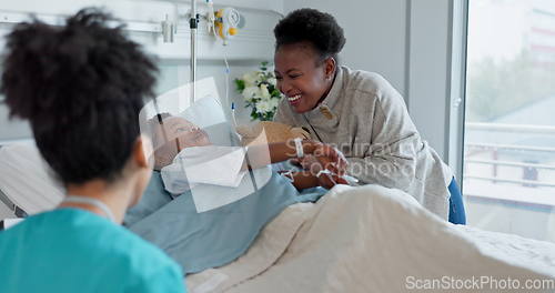 Image of Nurse, mother and son playing in a hospital together during recovery with professional care. Medicine, funny family and children with people in a healthcare clinic for rehabilitation or treatment