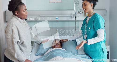 Image of Medicine, mother and son talking in a hospital for healthcare advice together during recovery. Nurse, family discussion and kids with people in a pediatrician clinic for rehabilitation or treatment