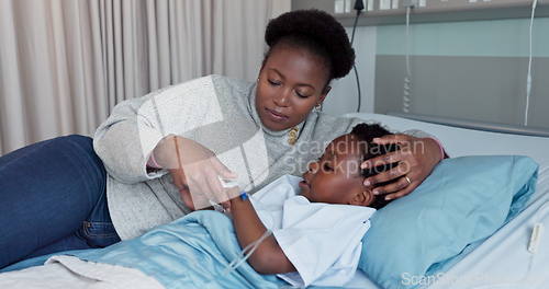 Image of Hospital, bed and mother with child for comfort, compassion and care with iv drip for surgery. Healthcare, African family and mom with support for kid for medical service, wellness and treatment