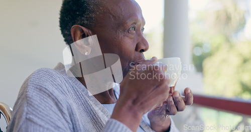 Image of Senior woman, thinking and relax with coffee on a front porch with nostalgia at a nursing home. Assisted living, tea and elderly African female enjoy a calm drink, peace or fresh air alone outdoors
