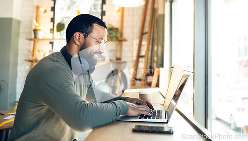 Image of Man, remote work and laptop in coffee shop, productivity with freelance worker and copywriter, writing article and blog. Workflow, typing on pc in cafe and copywriting with technology and research