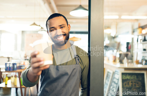 Image of Portrait, happy man or barista with smile for coffee cup in hand for customer. African, person or employee of small business with order of cappuccino, latte or drink in store, cafe or shop for offer