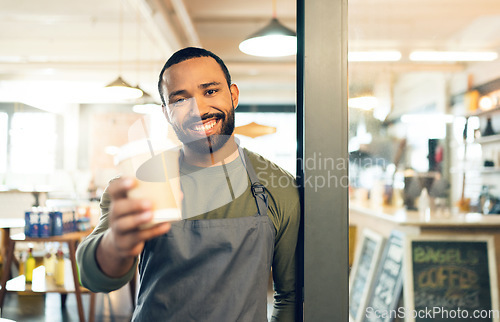 Image of Coffee cup, portrait and man in cafe offer drink, warm beverage and catering for hospitality services. Happy restaurant manager, barista and waiter giving take away latte, hot cappuccino and espresso