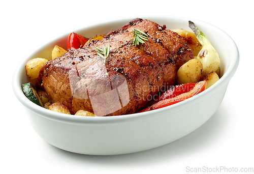 Image of bowl of whole roast pork and vegetables