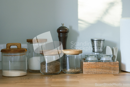 Image of various containers on kitchen table